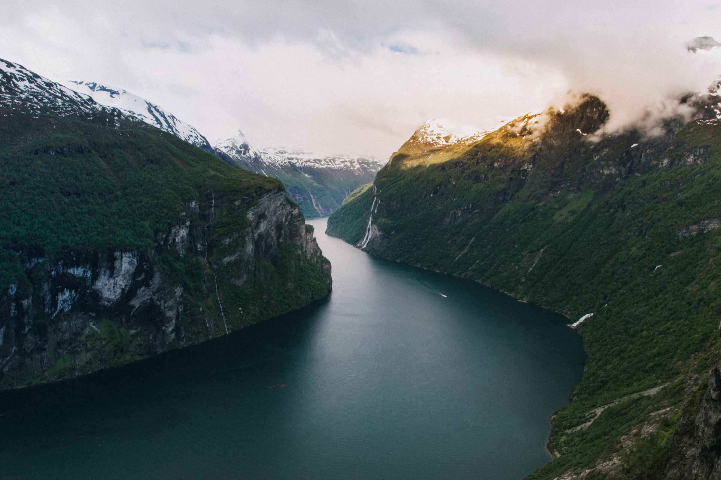 Geirangerfjord in Norway, surrounded by mountains